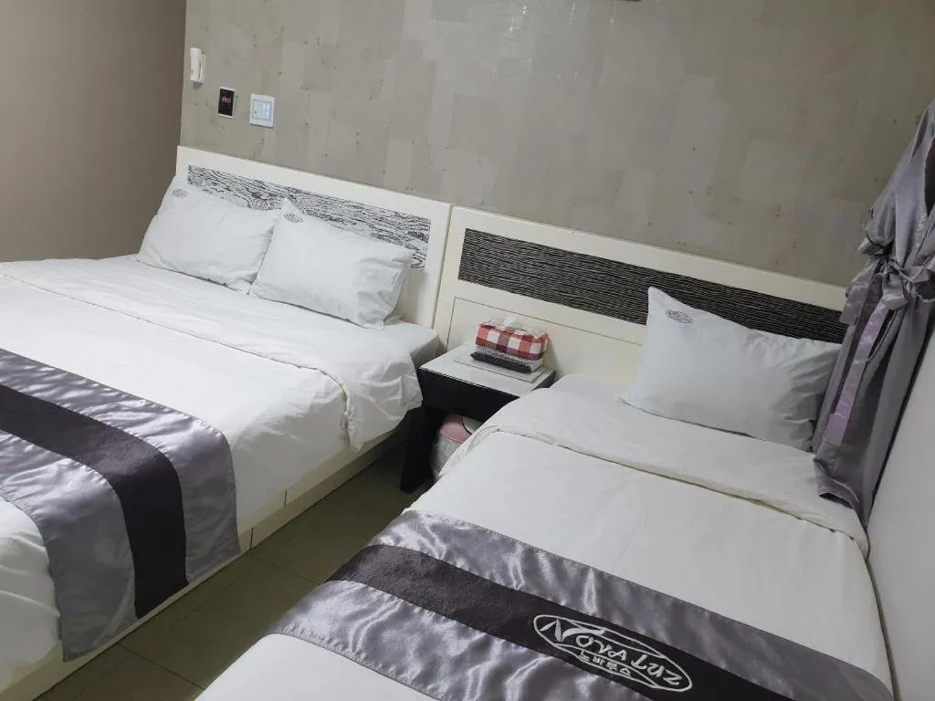 Bed in Novalus Tourist Hotel