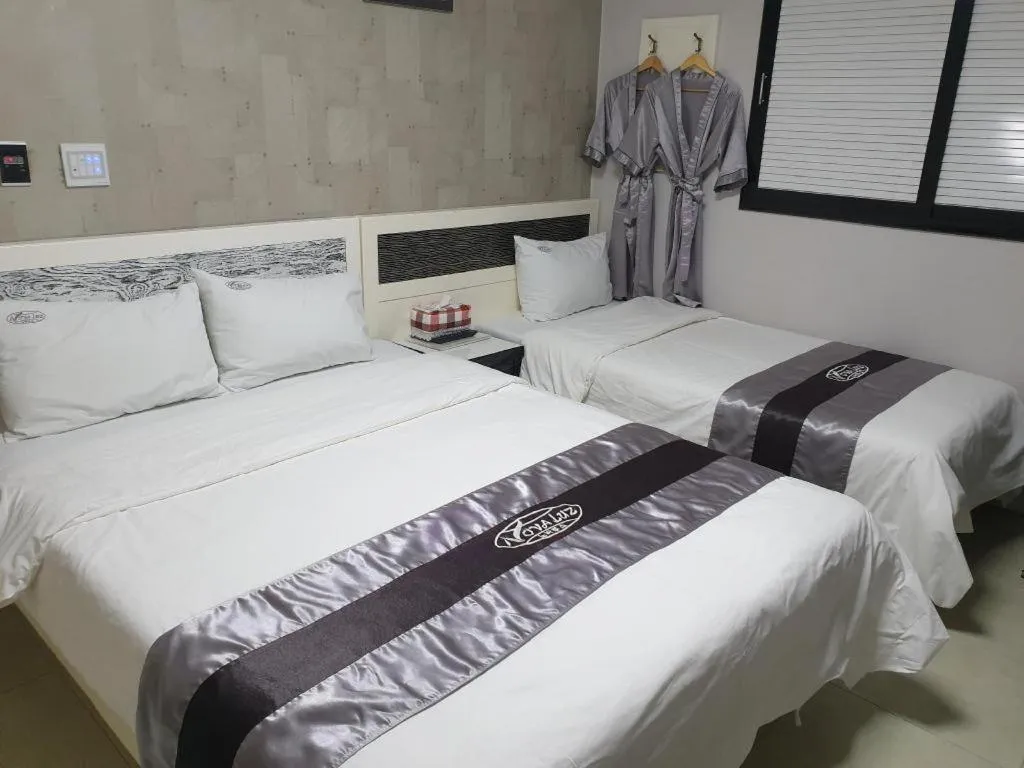 Bed in Novalus Tourist Hotel