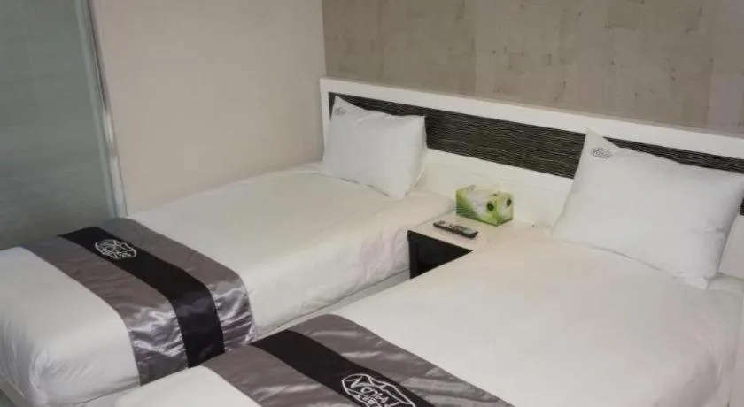 Bed in Novalus Tourist Hotel