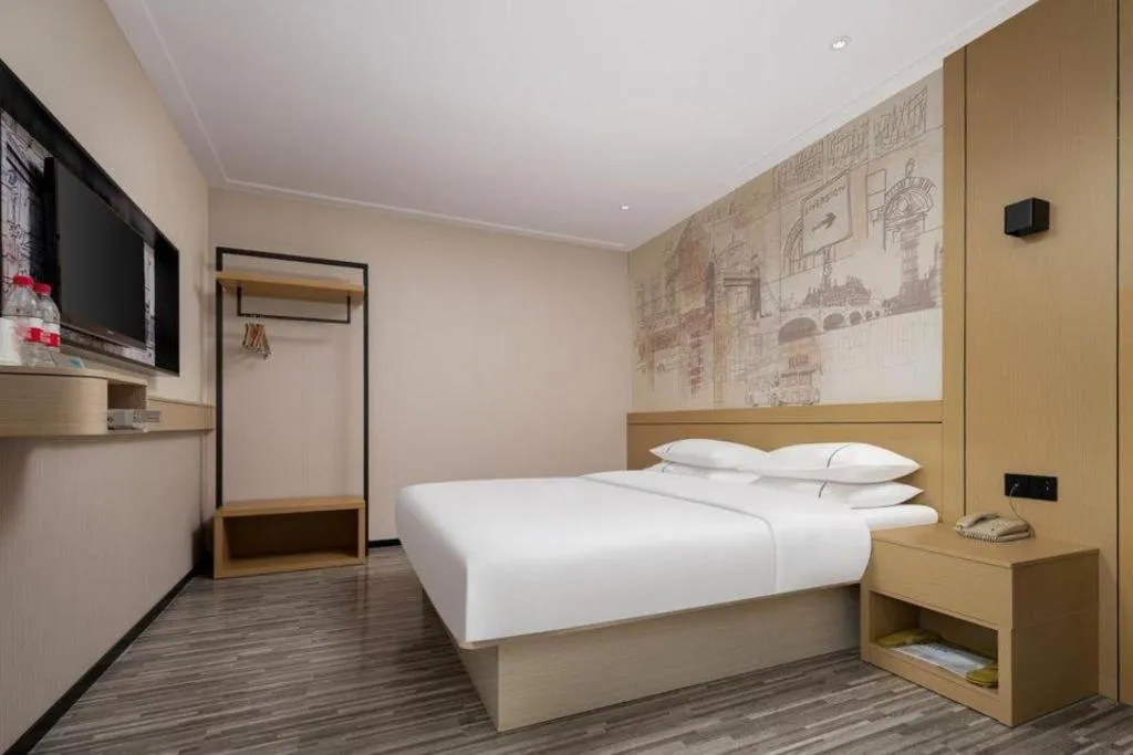 Bed in City Comfort Inn Liuzhou Beique Road Huang Village