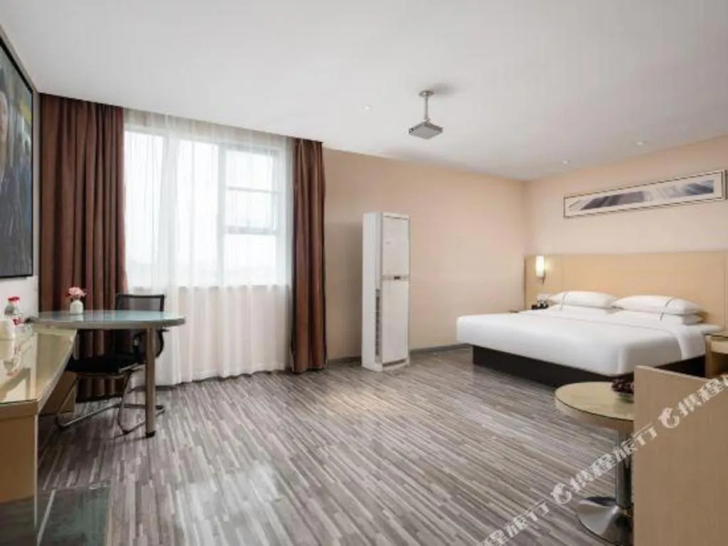 Bed in City Comfort Inn Liuzhou Beique Road Huang Village