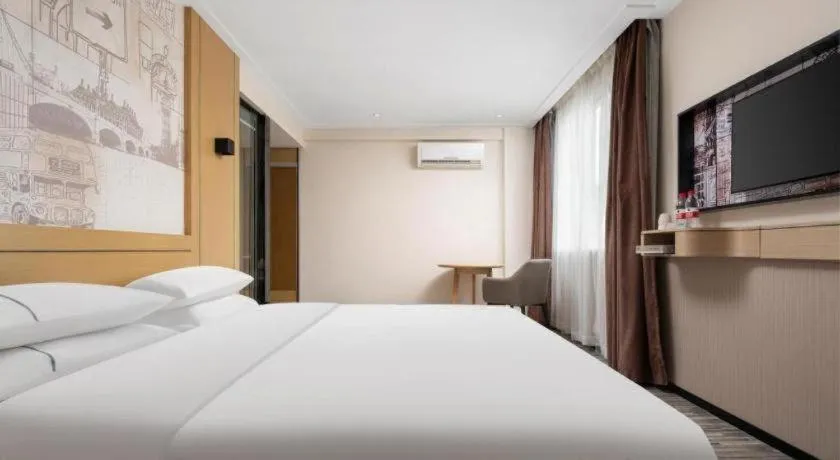 Bed in City Comfort Inn Liuzhou Beique Road Huang Village