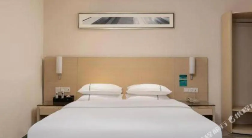 Bed in City Comfort Inn Liuzhou Beique Road Huang Village
