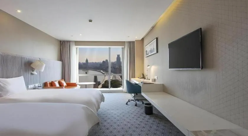 Bed in Shanghai Bund South China Harbour View Hotel