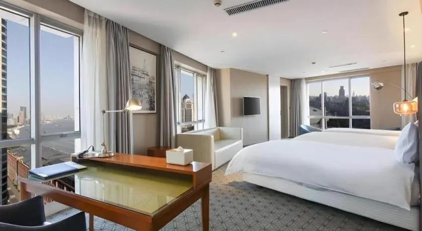 Bed in Shanghai Bund South China Harbour View Hotel