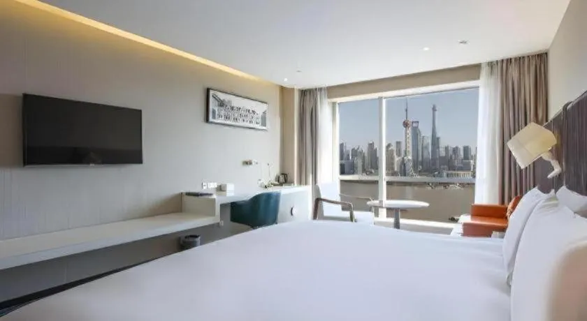 Bed in Shanghai Bund South China Harbour View Hotel