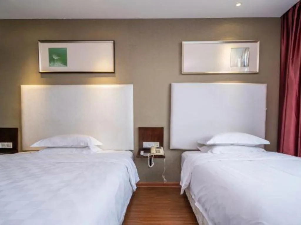 Bed in Xiamen Blue Peninsula Hotel