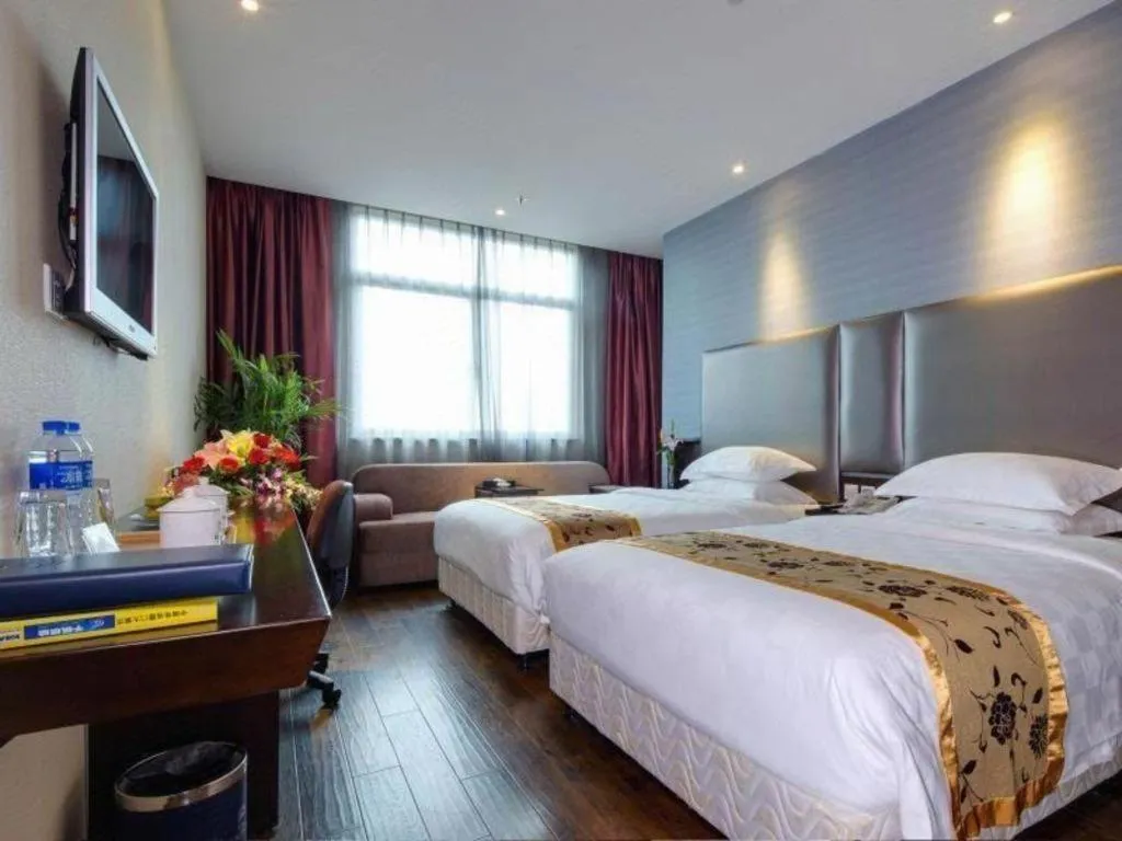 Bed in Xiamen Blue Peninsula Hotel