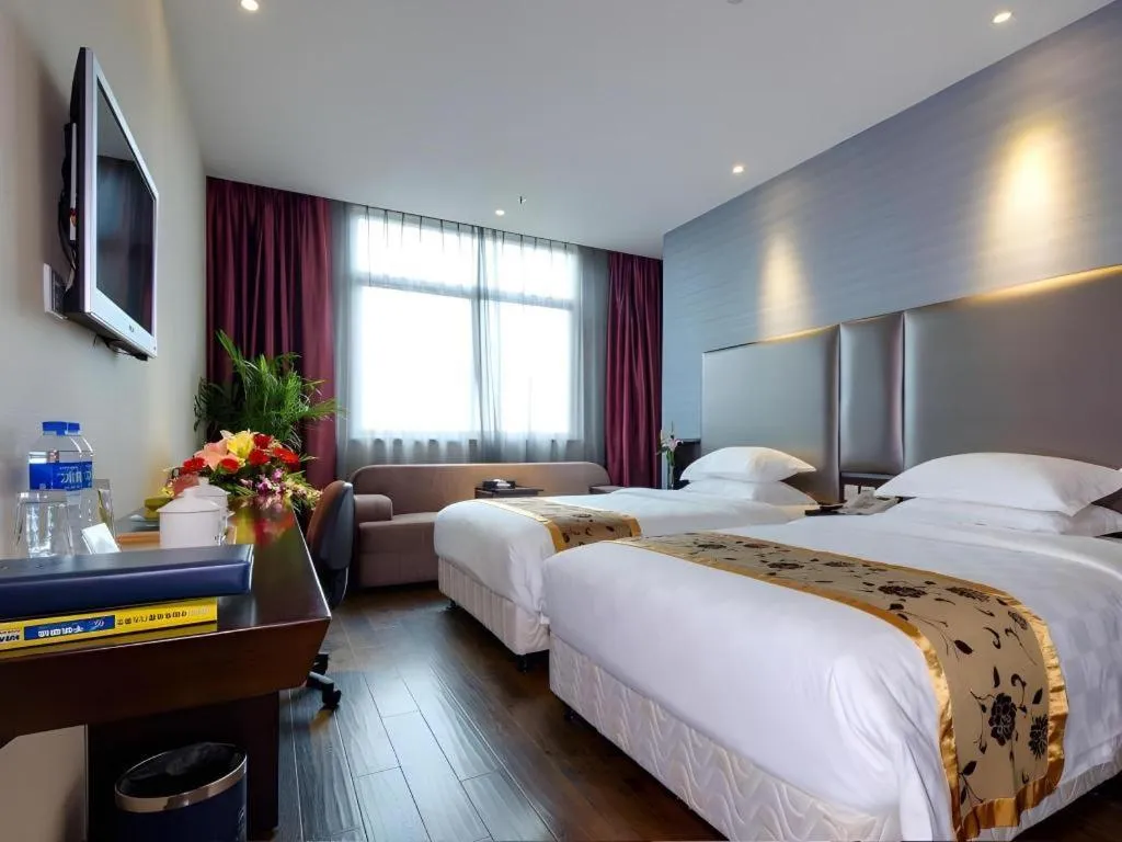 Bed in Xiamen Blue Peninsula Hotel
