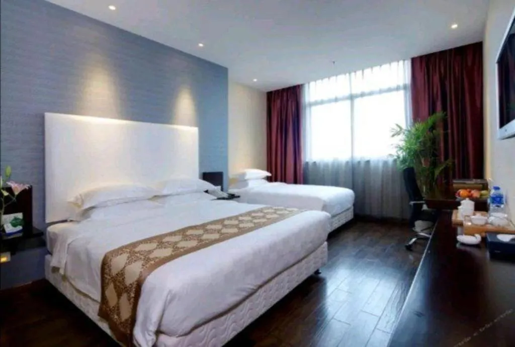 Bed in Xiamen Blue Peninsula Hotel
