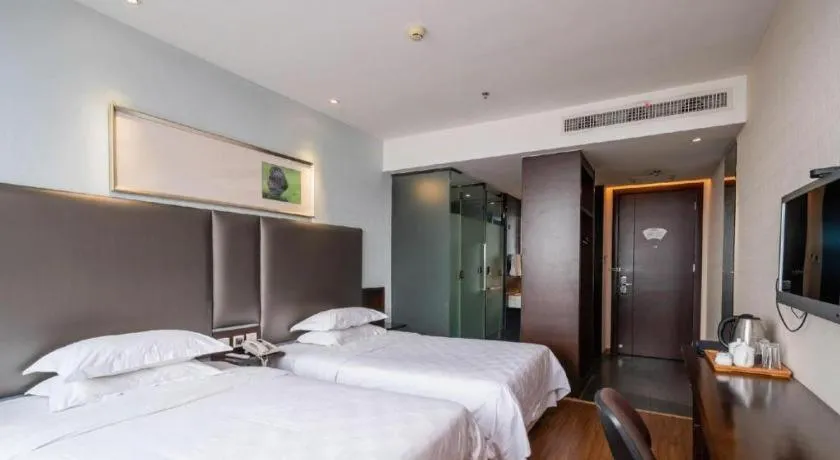 Bed in Xiamen Blue Peninsula Hotel