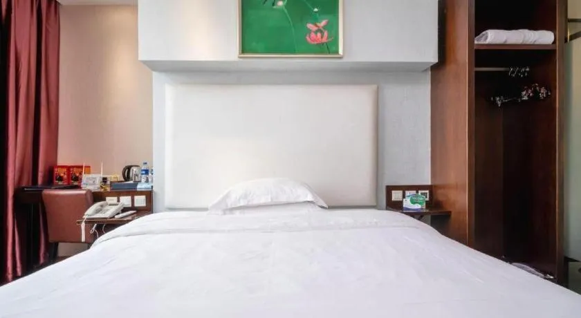 Bed in Xiamen Blue Peninsula Hotel