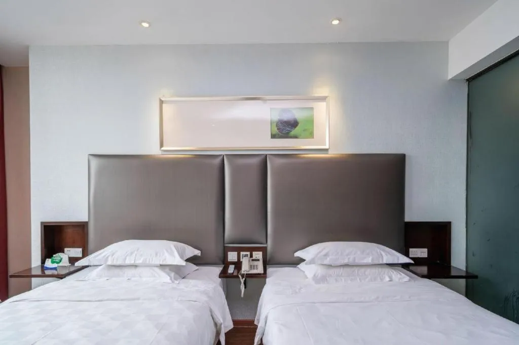 Bed in Xiamen Blue Peninsula Hotel