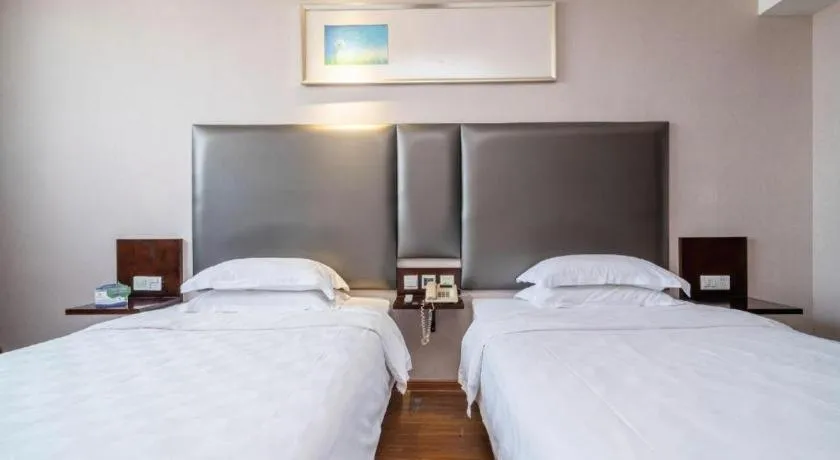 Bed in Xiamen Blue Peninsula Hotel