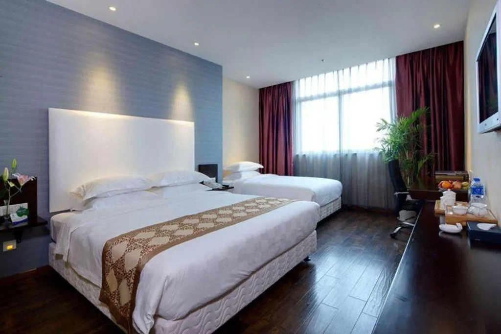 Bed in Xiamen Blue Peninsula Hotel
