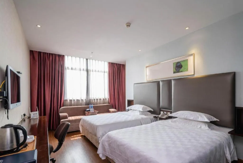 Bed in Xiamen Blue Peninsula Hotel