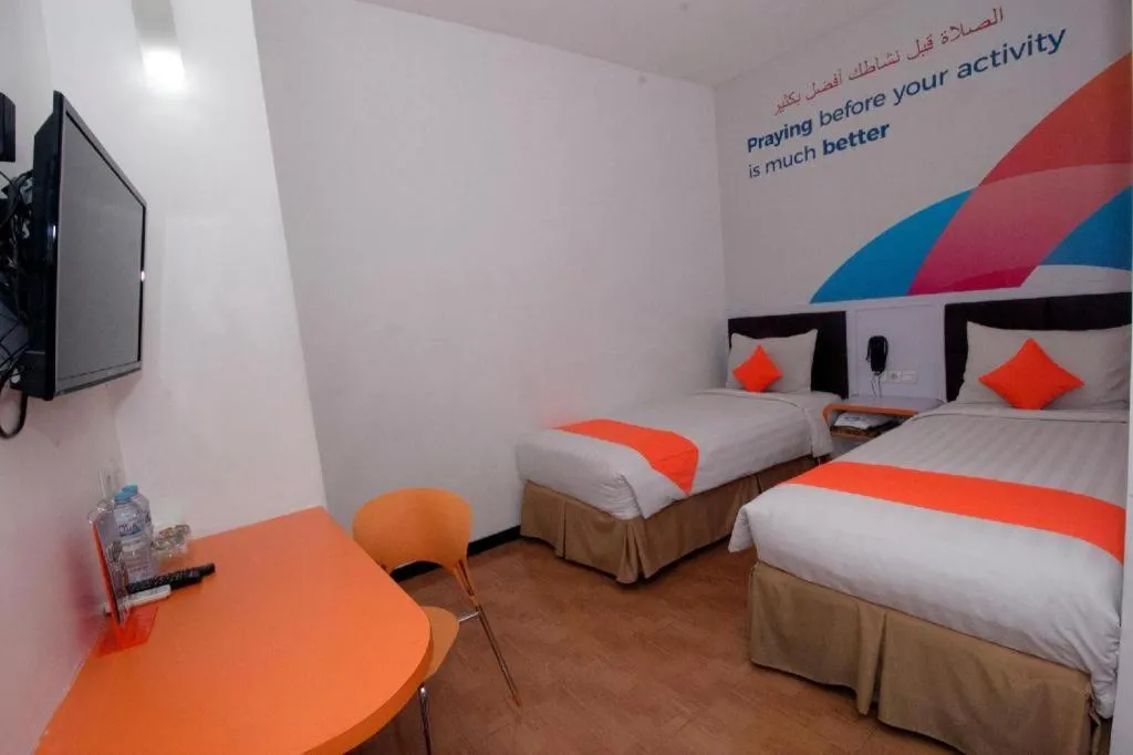 Bed in Oriza Hotel Surabaya