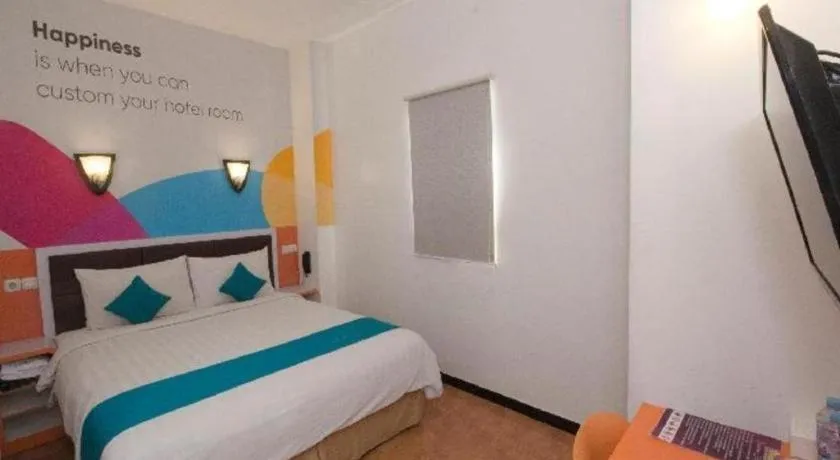 Bed in Oriza Hotel Surabaya