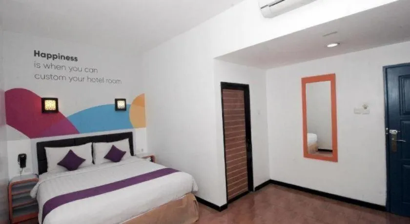 Bed in Oriza Hotel Surabaya