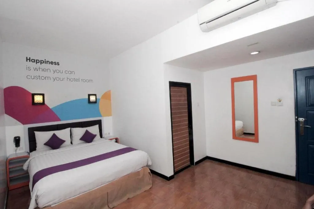 Bed in Oriza Hotel Surabaya