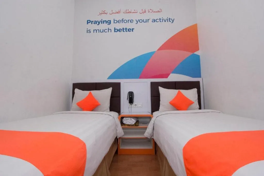 Bed in Oriza Hotel Surabaya