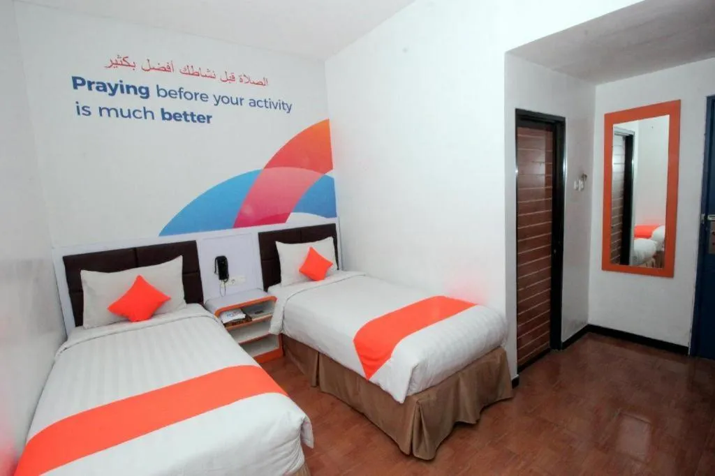 Bed in Oriza Hotel Surabaya