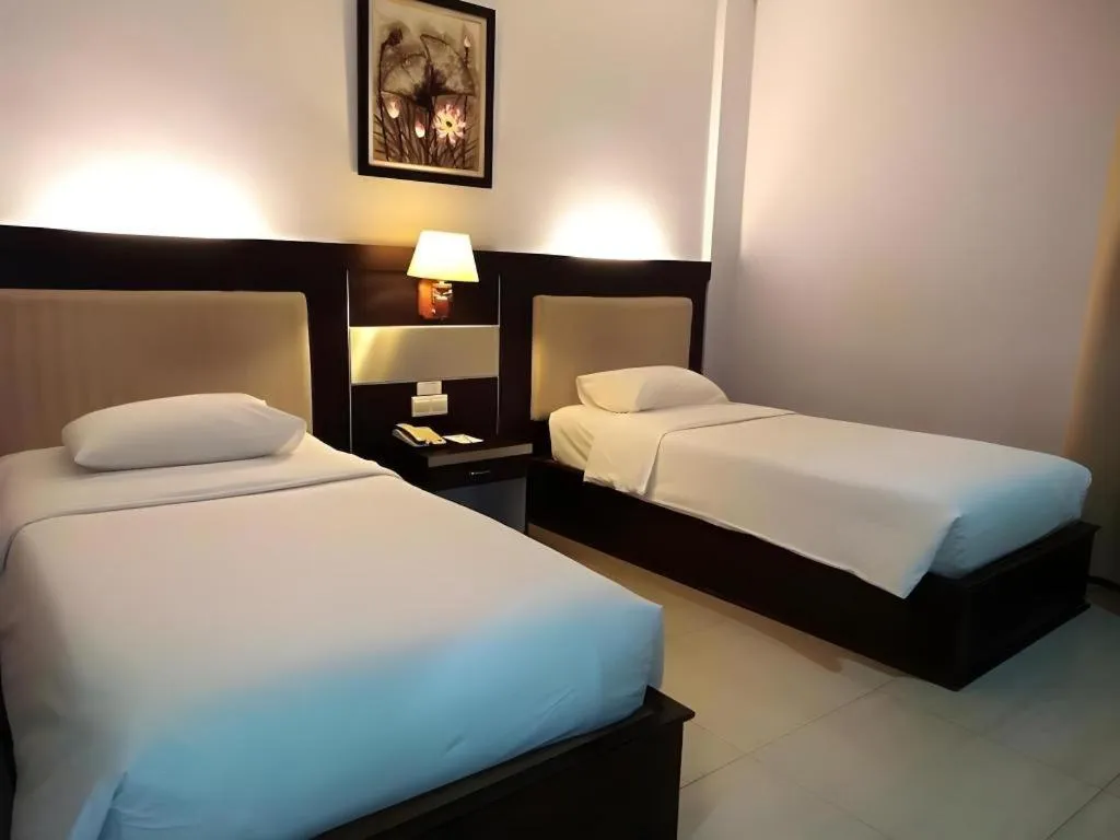 Bed in Zahra Syariah Hotel Kendari
