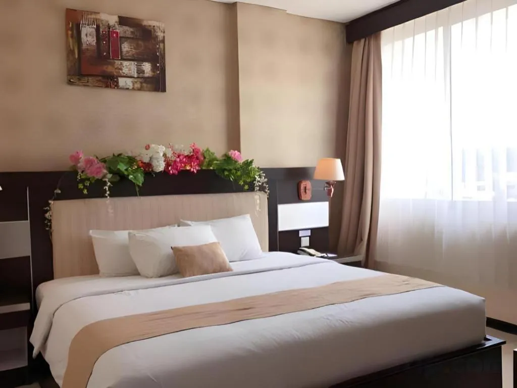 Bed in Zahra Syariah Hotel Kendari