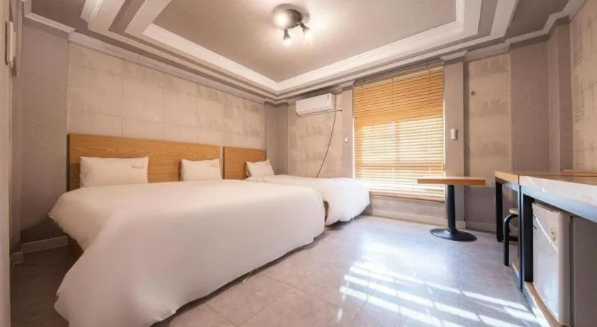 Bed in Gwangju Sejong Hotel