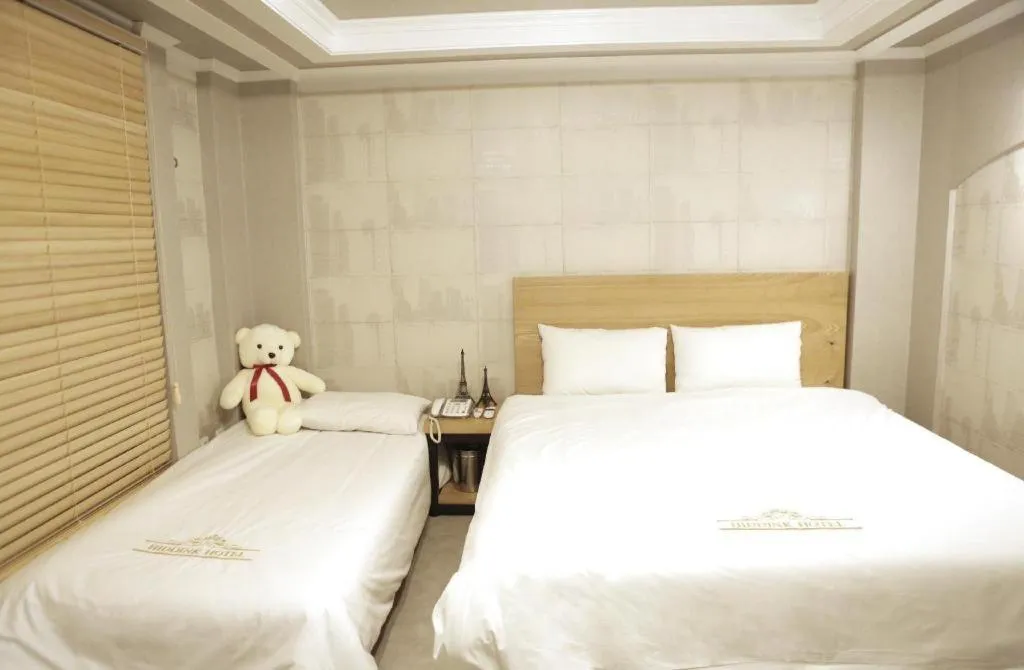 Bed in Gwangju Sejong Hotel