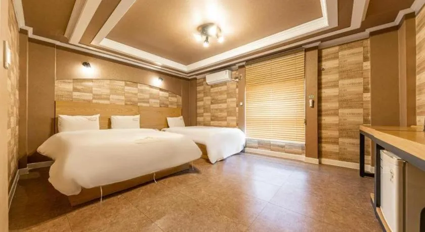 Bed in Gwangju Sejong Hotel