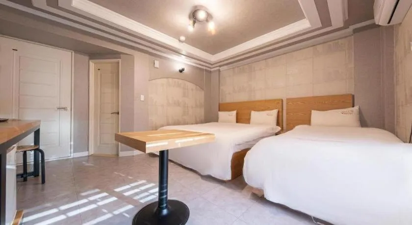 Bed in Gwangju Sejong Hotel