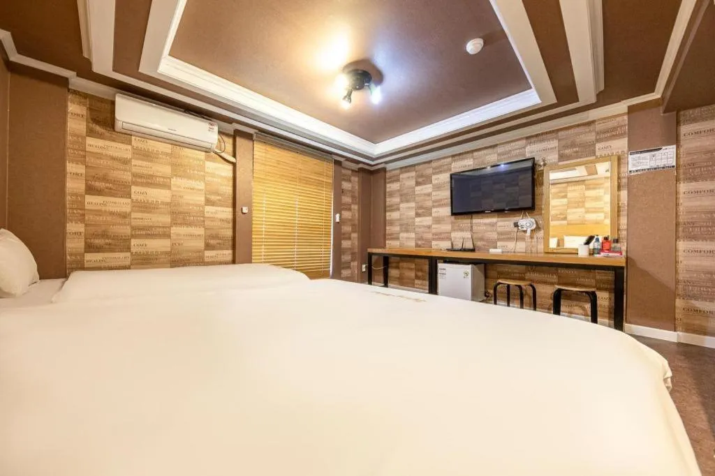 Bed in Gwangju Sejong Hotel