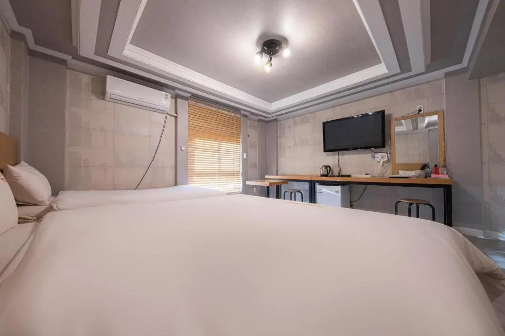 Bed in Gwangju Sejong Hotel