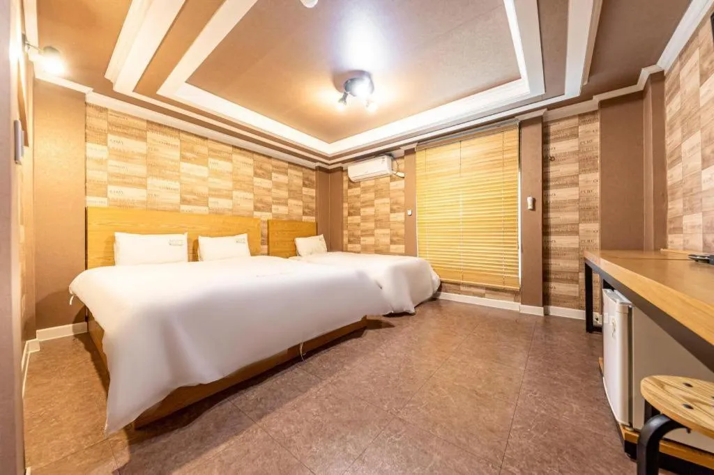 Bed in Gwangju Sejong Hotel