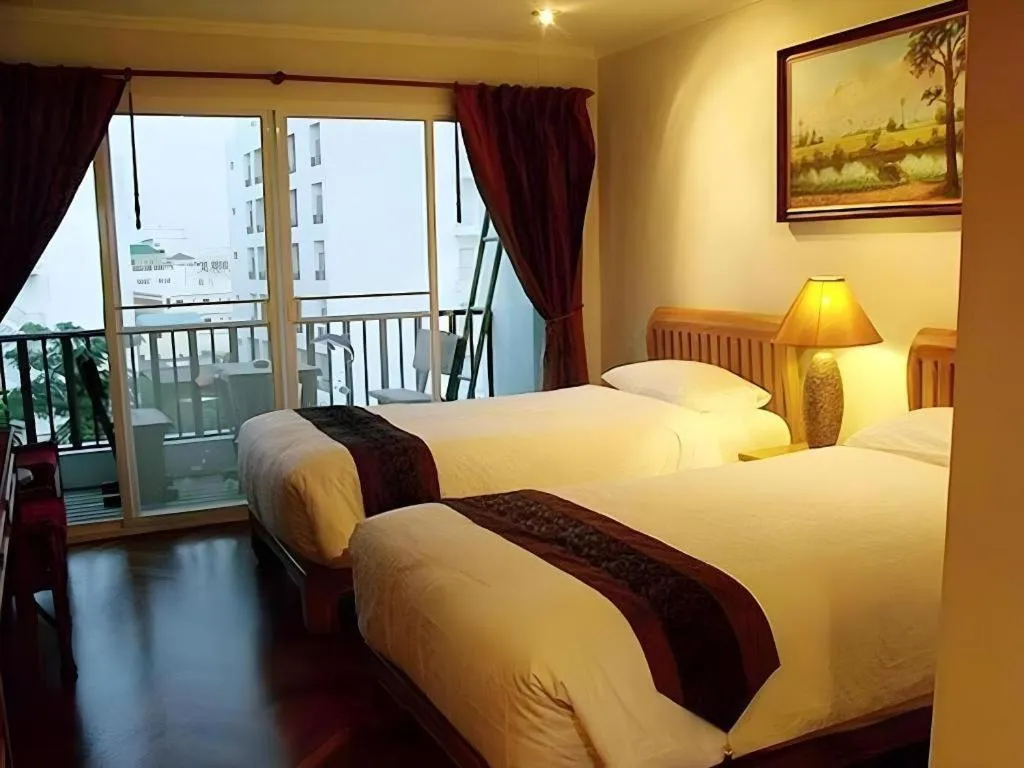 Bed in Chada Thai House