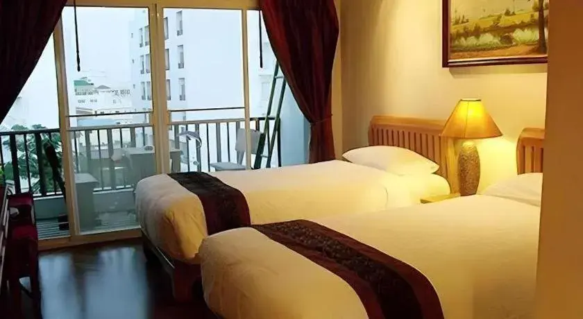 Bed in Chada Thai House Bed in Chada Thai House