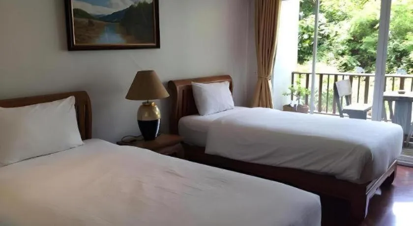 Bed in Chada Thai House