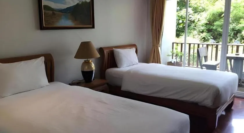 Bed in Chada Thai House