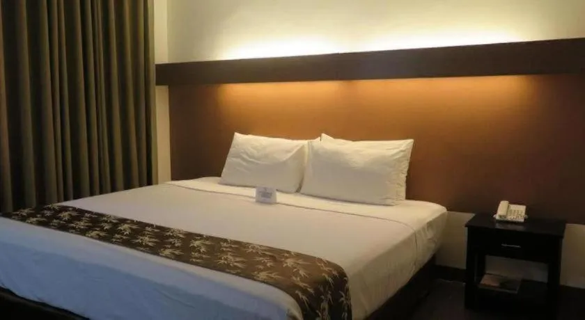 Bed in The Ritz Hotel at Garden Oases