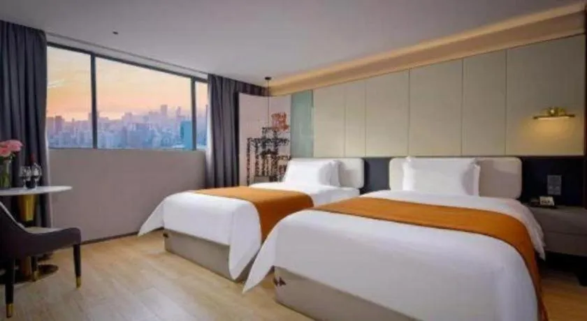 Bed in Bravo Business Hotel