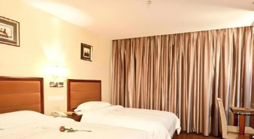 Bed in Bravo Business Hotel