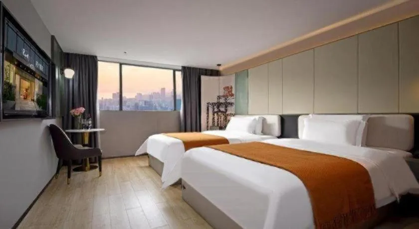 Bed in Bravo Business Hotel