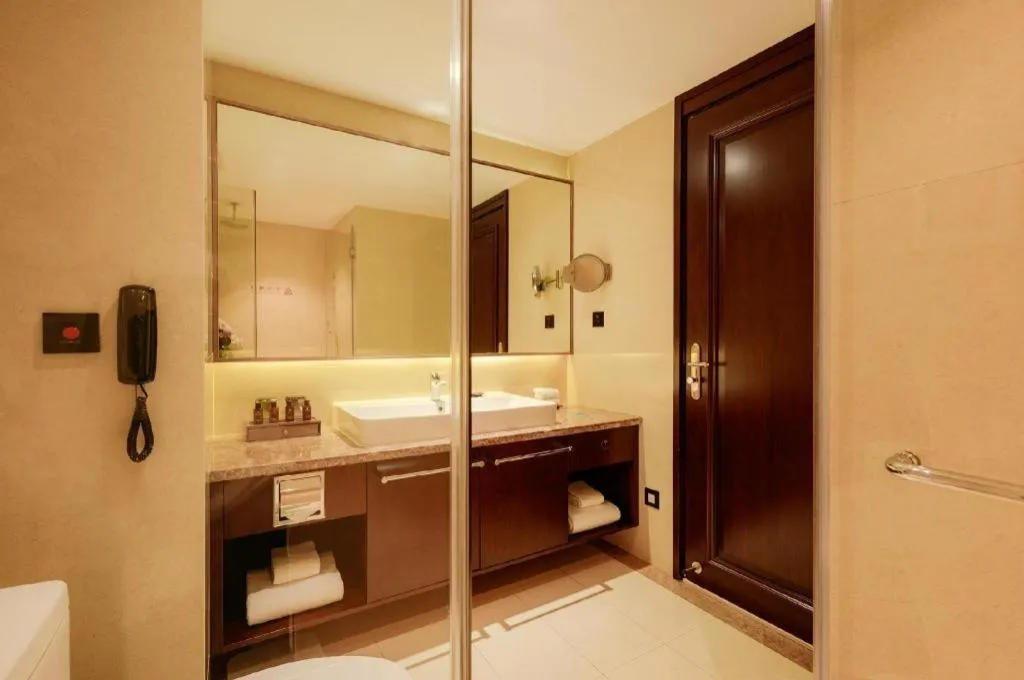 Bed in Sky World Hotel Qingdao