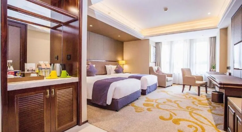 Bed in Sky World Hotel Qingdao