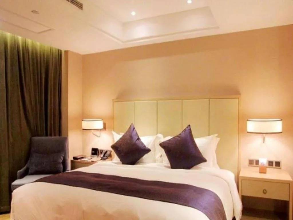 Bed in Sky World Hotel Qingdao