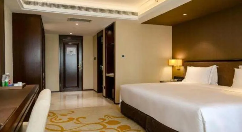 Bed in Sky World Hotel Qingdao