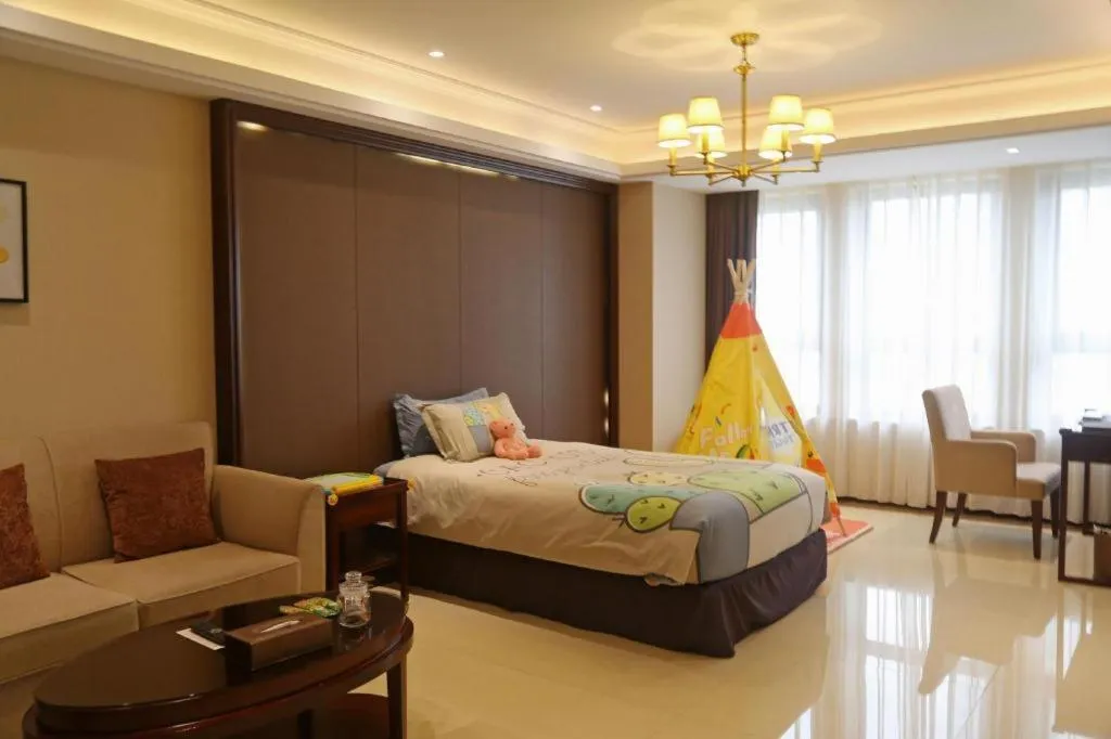 Bed in Sky World Hotel Qingdao