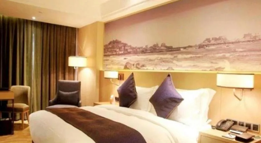 Bed in Sky World Hotel Qingdao