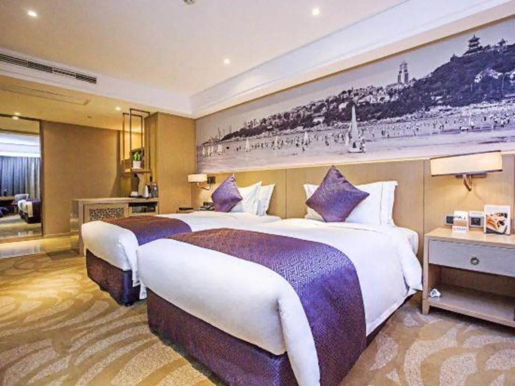 Bed in Sky World Hotel Qingdao